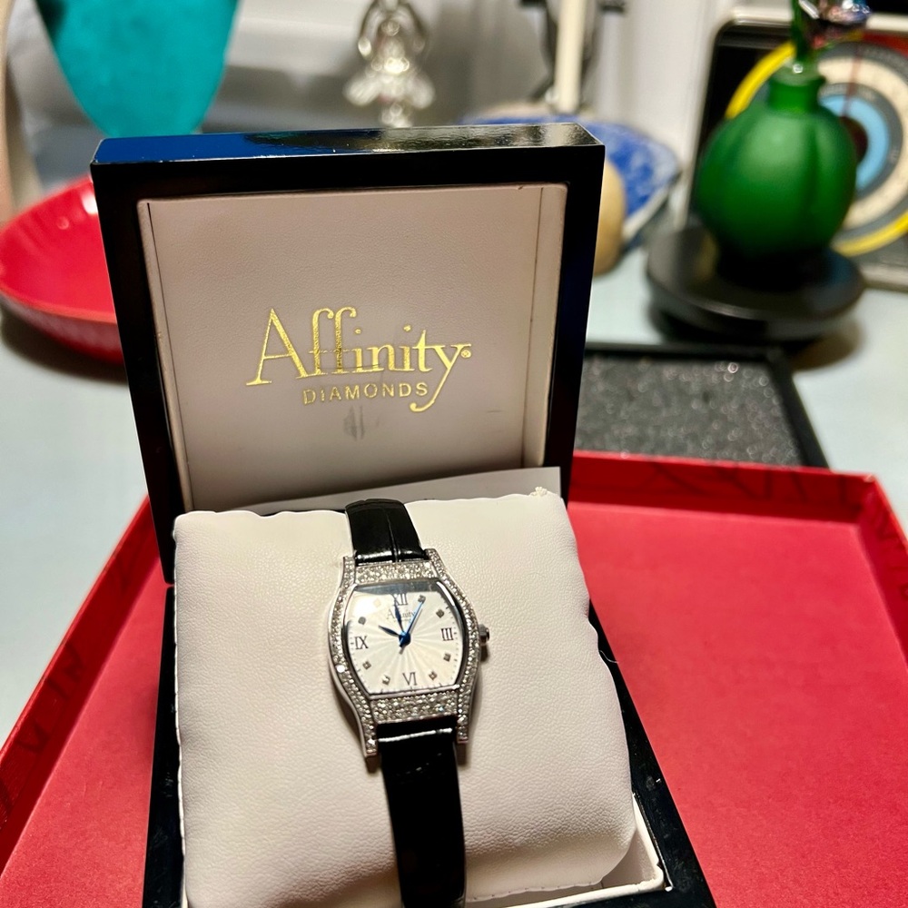 Affinity Watch, stainless silver case and back, Swiss movements.